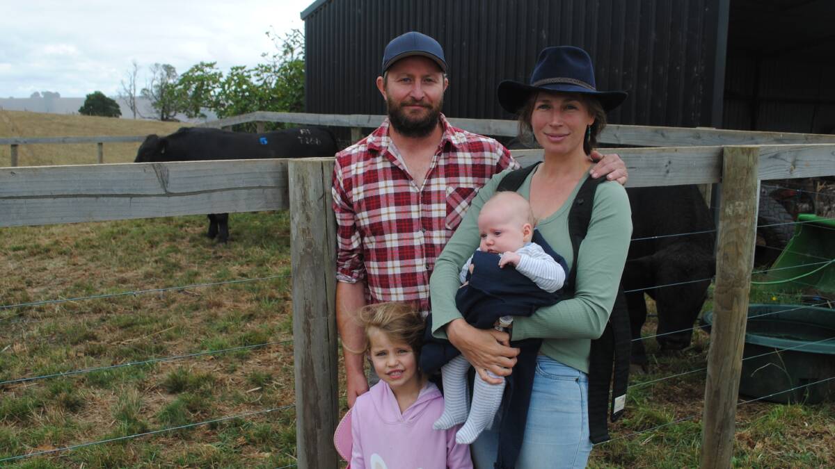Sam and Megan Dakin, Kilcunda, with daughter Beth (six) and son Micah (two months) were first time buyers at the sale. Picture by Barry Murphy