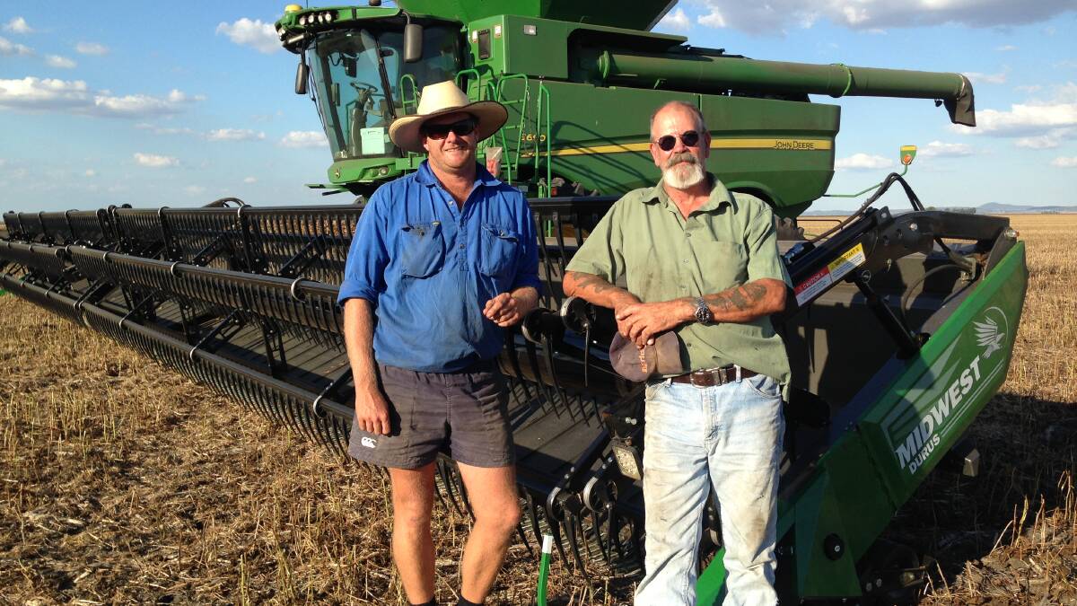 Michael Coleborn (left) with Jim Hesbrook, both of GD Farming Toowoomba, with Midwest's 18.0m Durus front during a trial run in mung beans.