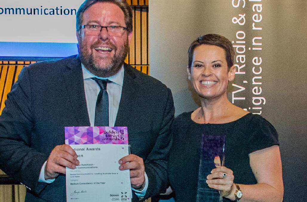 Sauce Communications principal, Liane Sayer-Roberts, collects the Public Relations Institute of Australia award from conference master of ceremonies, Shane Jacobson.