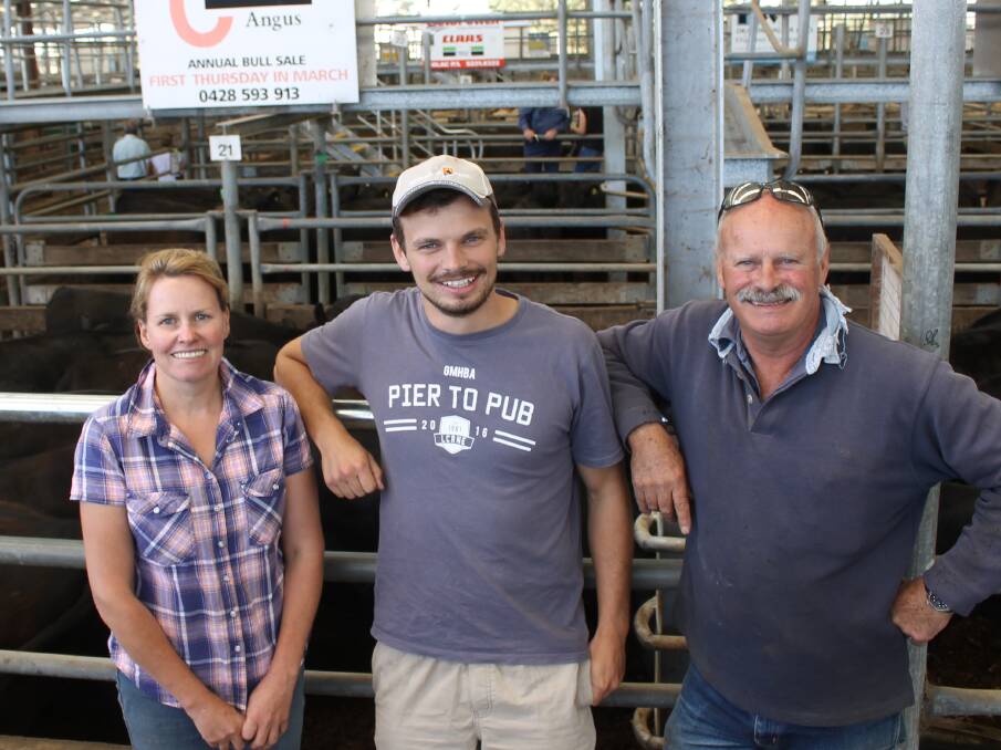 Farm manager Sarah Tate with Jack and Andrew Steel, Penrith Nominees, Winchelsea, with their top pen of 19 Angus heifers, 341kg, Te Mania blood, that made $1320.