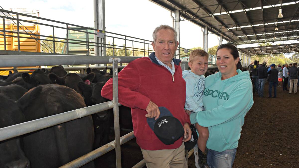 Malcolm White, Inverugie Pastoral, Yea, (with his daughter Erin Heal and her son Harry, 3) was amazed his lighter steers made a higher price than his heaviest pens.
