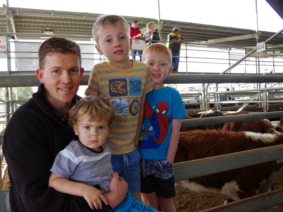 Tim Morrison and his sons Liam (2), Xavier (7) and Caleb (5), Bairnsdale, bought this pen of Hereford and black baldy heifers, paying to $760 each.