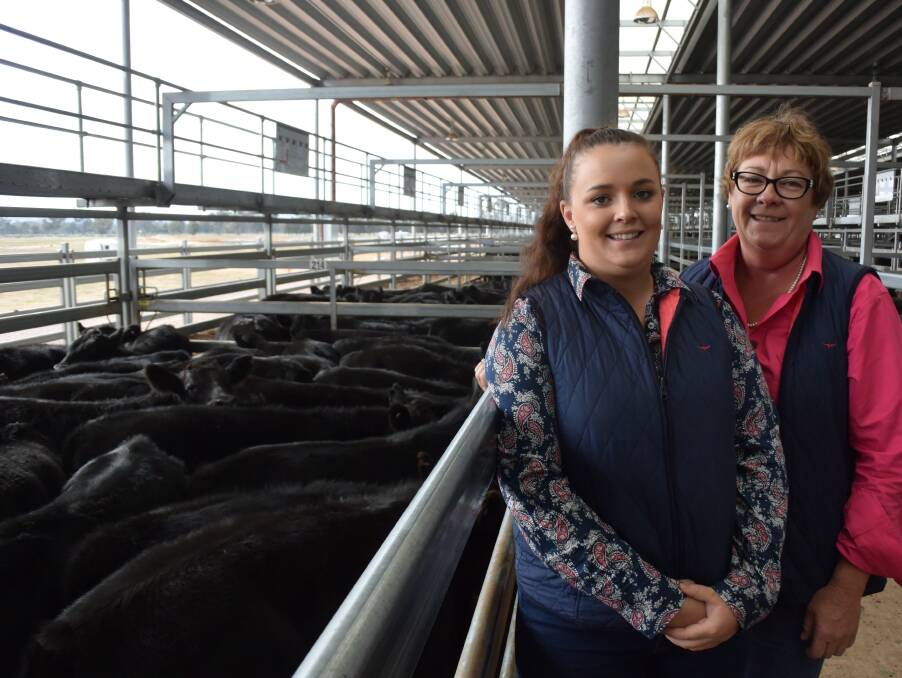 QUALITY: Chantelle and Chris Gorman, Allawah, Savernake NSW, with their top pen of 26 Angus steers, 8-9 months-old, 346kg, that made $1120.