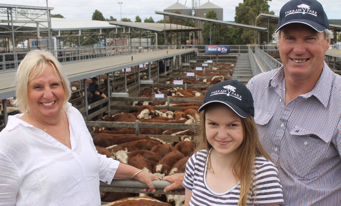 Good money: Carolyn, Hayley, 16, and Paul Malseed, Condah, sold 186 Orana Partnership steers at Hamilton yesterday.
