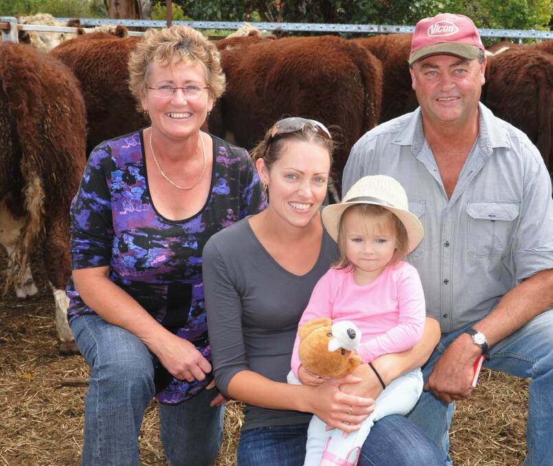 Jackie and Kelvin Pendergast with daughter Nicole White and her daughter Olivia. They sold 80 Hereford steers, April /May drop with a pen 15 topping at $1300.