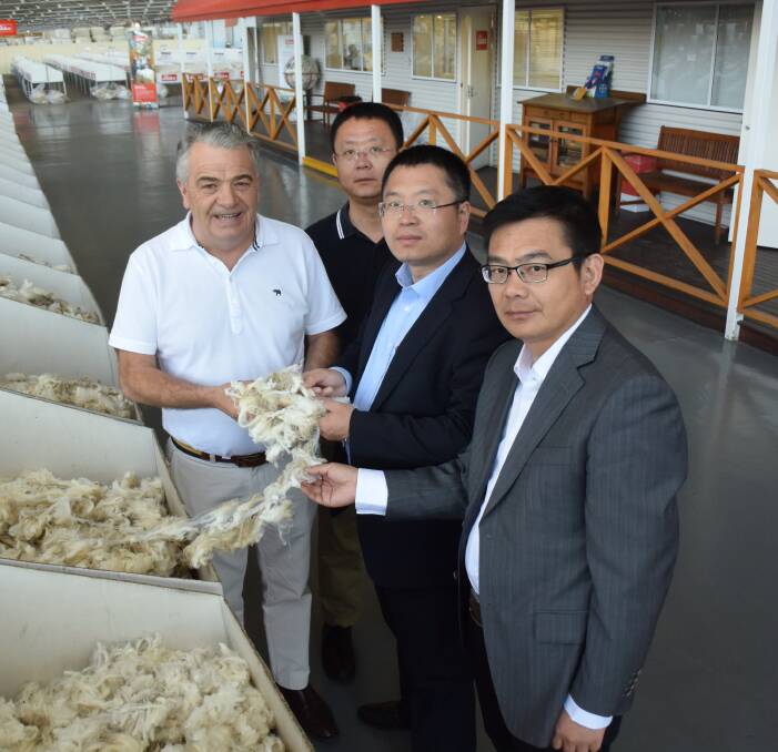 Woolmark’s general manager of product development Jimmy Jackson; Nanshan Wool Fabric's tops factory director Wang Sheng; its general director Cao Yiru; and Nanshan Fabric & Garments' chief engineer Liu Gangzhong.