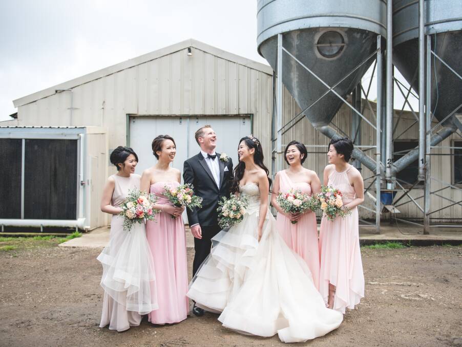 Bridesmaids Zoe Ke, Emily Yeung, Cindy Ke and Josephine Ta with the newlyweds. Photos courtesy Monsing Productions.