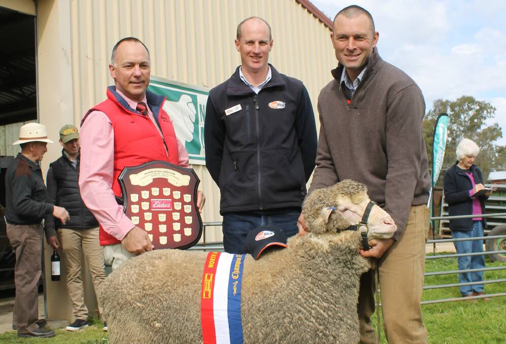 Jim Bruce, Elders, Jonathan Nield, CopRice, and Simon Riddle, Toland Poll Merino stud, Violet Town, with the champion all purpose ram.