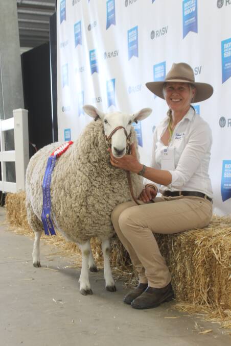 Kylie Anderson with the Talkook stud's champion Border Leicester ewe.