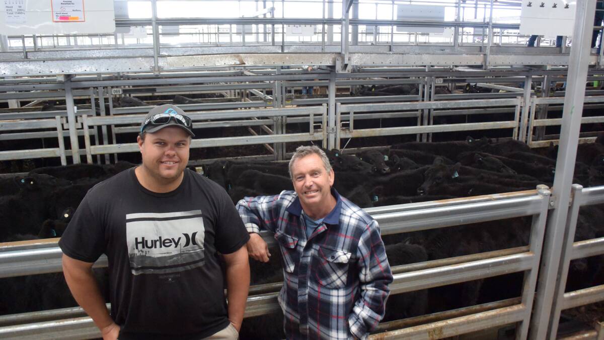 Adam Szabolics (left), Wodonga, purchased these 50 Angus heifers, 230kg, sold by Yencken Pastoral, Kooyong, for $730. He said this "great line of cattle" had good frames. He will grow them out and join then, possibly to sell as springers. He was pictured with friend Leon Phillips, Leneva.