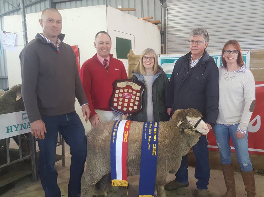 The Toland Poll Merin ram that won the all purpose and wool sale ram sashes was pictured with Simon Riddle, Jim Bruce, and Georgina, Phil and Anna Toland.