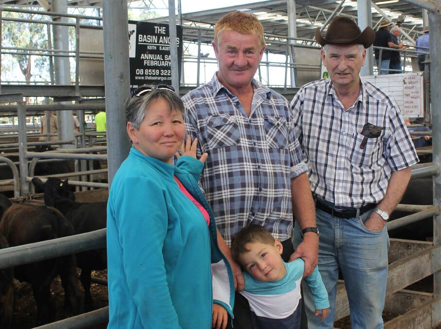 The Andrew family of Zhanar, John and son Nicolas, 4, of Beech Forest, bought heifers from Brian Botwell to grow out and join.