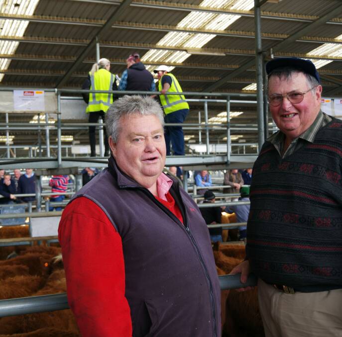 Ken Connell, Elders Warragul, with David Tomasetti, Drouin, who bought three pens of Hereford steers and a pen of Angus heifers with calves at-foot.