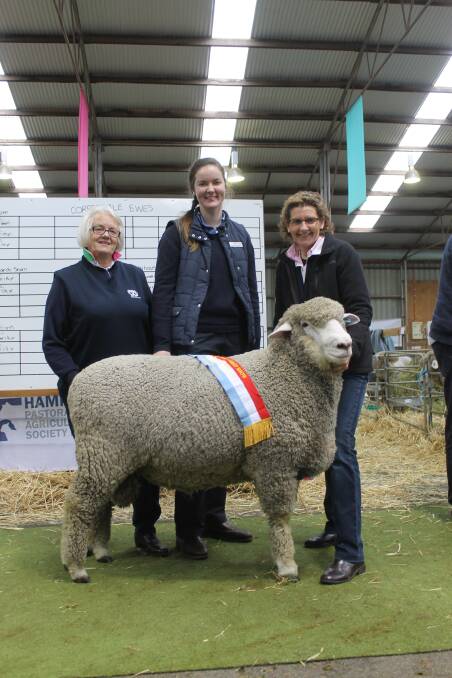 Judge Jan Hunt, formerly of Wye Corriedale stud, South Australia; Hannah Ronaldson, Rural Finance, and Bron Ellis, Sweetfield, with the grand champion Corriedale ram. 