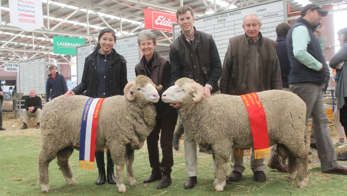 Heidy, Caroline and Angus Heath with Ross Wells and Willandra's champion unhoused ram and reserve.