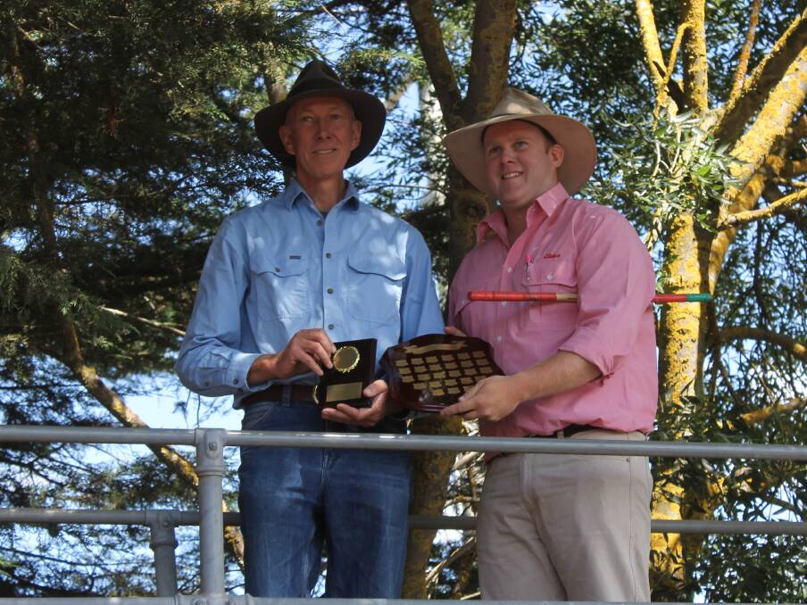 Tim Reid won best presented pen (presented by Dean Coxon, Elders) for his 23 Angus calves, Leven Vale bld, 382kg, which sold for $1430 to Rodwells Pakenham.