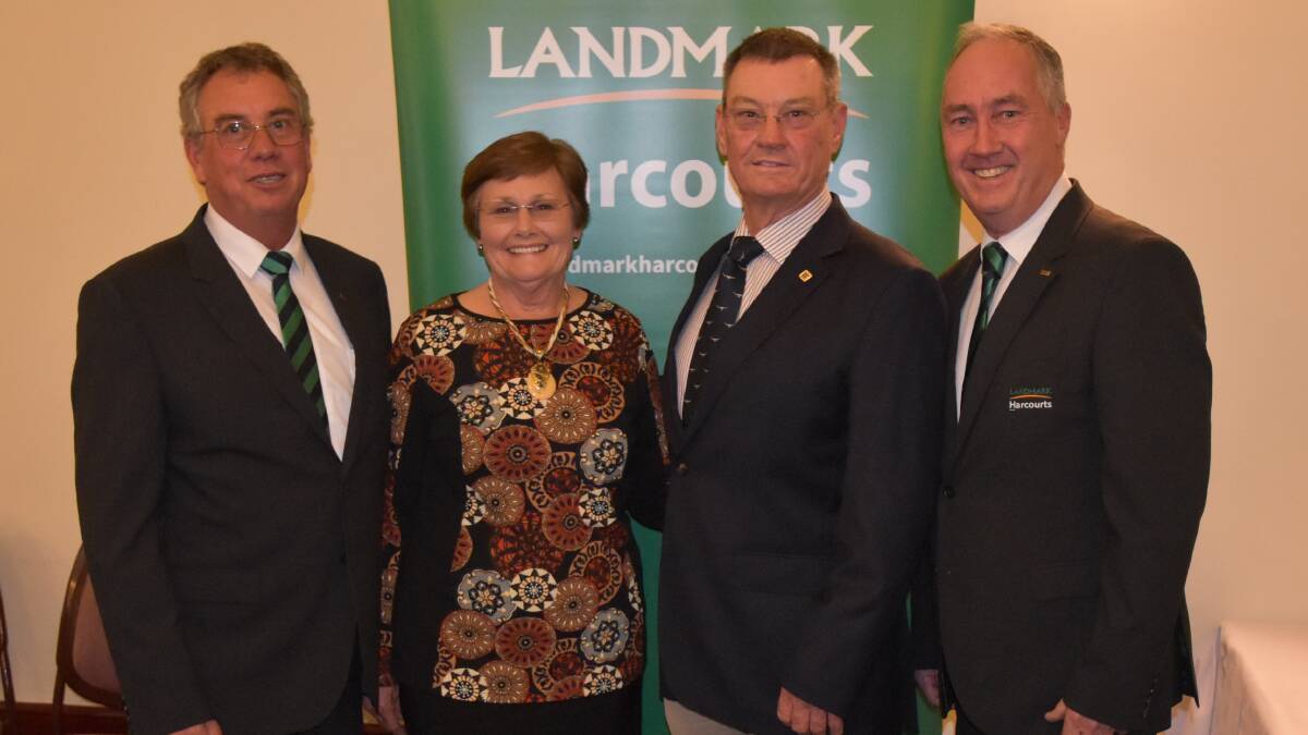 SALES SUCCESS: Thrilled vendors Kathy and Darrel Fargher (centre), who sold Martins Well for $5.975m walk-in, walk-out, with Landmark Harcourt's Tim Wooley, Port Augusta, and SA auctioneer Simon McIntyre.