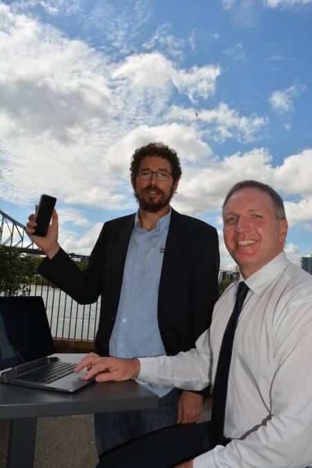Rangeland scientist Dr Terry Beutel, from Queensland, and business development and research manager with CRC for Spatial Information Phil Tickle, from Victoria, showcase online tools for beef producers.