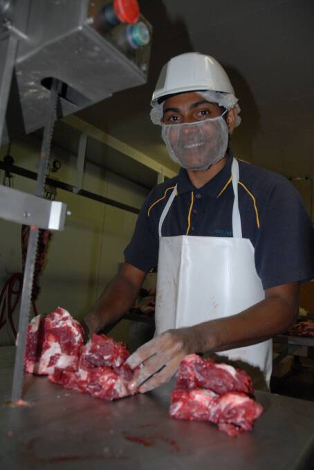 A worker at the Gunbalanya meatworks in the Northern Territory.