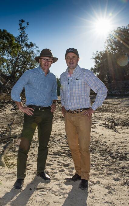 ON TOUR: Greens leader Richard Di Natale and Greens agriculture spokesperson Jeremy Buckingham on the dry riverbed of the Lower Darling River. Photo: MAX PHILLIPS