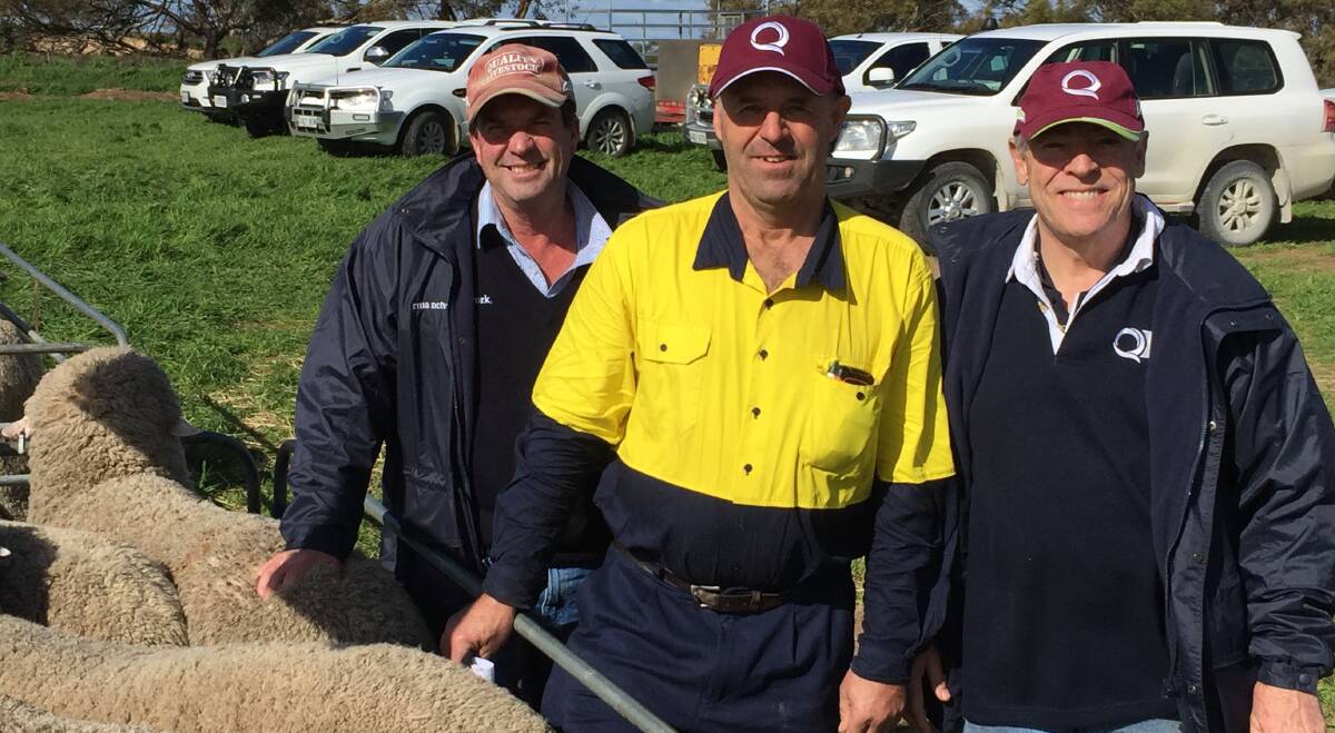 QUALITY ADVICE: Parilla producer John Gilbertson (centre) with his Quality Livestock agent Steve Davidson and Quality Wool agent Greg Ewens.
