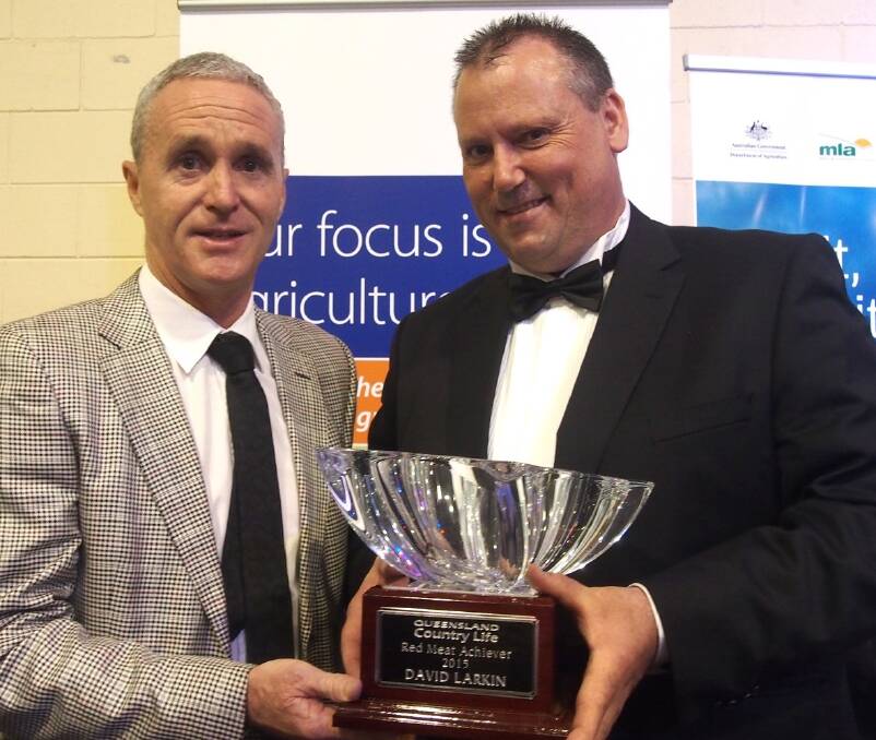 The 2015 Red Meat Industry Achiever David Larkin (right) with Fairfax Agricultural Publishing general manager John Warlters.
