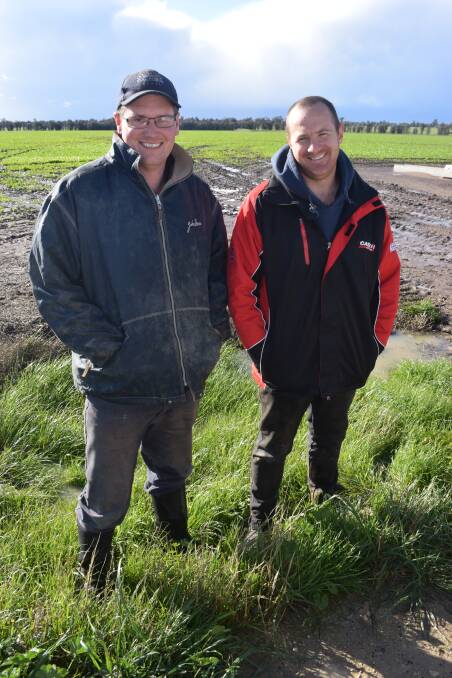 Noradjuha's John Heard and Lockie Wilson, Clear Lake, needed the winter footwear as they looked around a canola crop sown by the Sudholz family at Noradjuha, south-west of Horsham last Friday following rainfall of 13mm the night before.