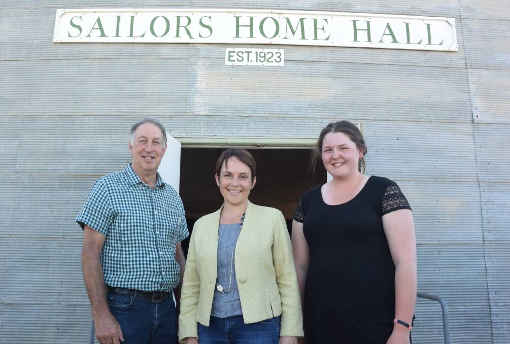 Pomonal farmer Terry May (left), agricultural trainee Jess Barrie (right) and Victorian Agriculture Minister Jaala Pulford at Murra Warra, north of Horsham on Friday. 