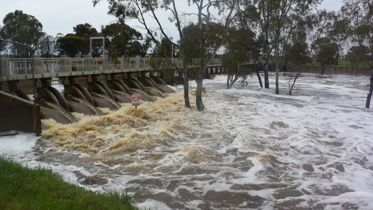 Water pours through the weir on the Wimmera River in Horsham on Tuesday.