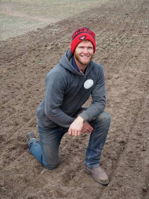 Kanagulk farmer Nic Pekin takes a break from sowing Samira broad beans at his Clear Lake property on Tuesday. Mr Pekin said rain over the weekend would be enough to get planted crops up. 