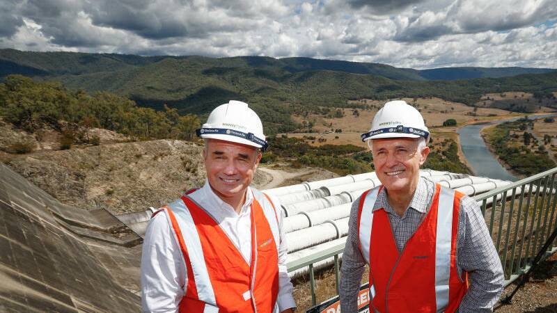 SNOWY PLAN: Prime Minister Malcolm Turnbull with Snowy Hydro CEO Paul Broad during his tour of the Snowy Hydro Tumut 3 power station in Talbingo, NSW. Photo: Alex Ellinghausen