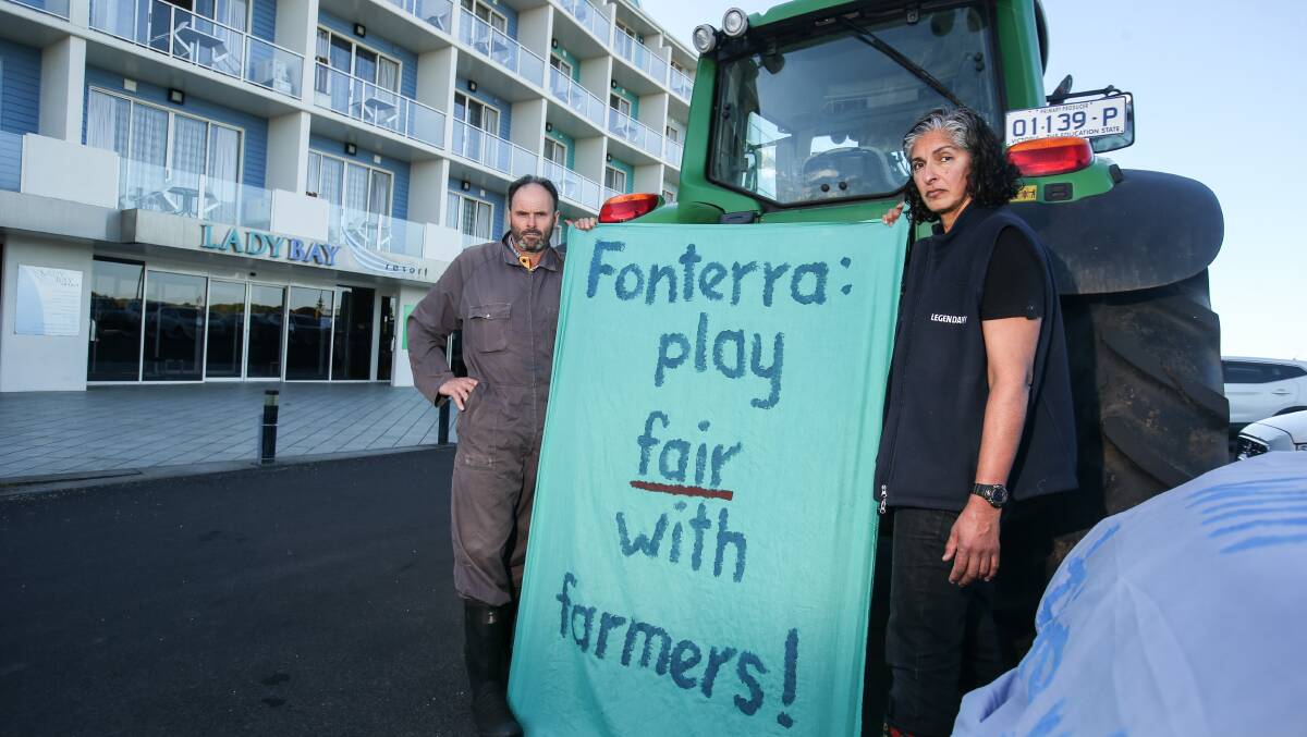 FONTERRA SCEPTICISM: South-Western Victorian dairy farmers Brian Schuler and Karinjeet Singh-Mahil protested outside Fonterra supplier meetings, in Warrnambool last year; Ms Singh-Mahil said she remained sceptical about the company's motives.