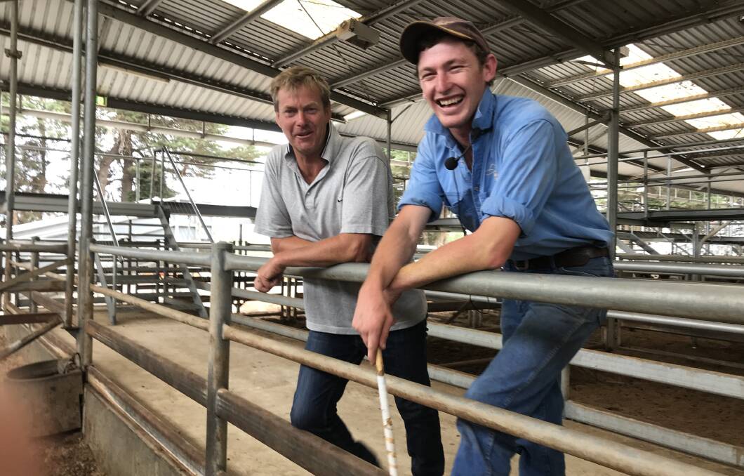 TOP LINE: Chris Nixon from PC Nixon & Co, brought forward a line of 146 cattle and was rewarded with sold prices, here with Mick O'Callaghan auctioneer for Sharp Fullgrabe, who sold a cow and calf unit for $1490.