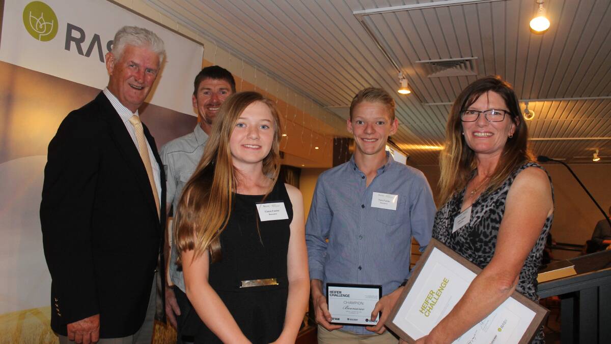 CHALLENGE WINNERS: Heifer challenge judge Bob Dent and winners, Boonaroo's Shane Foster, daughter Claire, son Tom and wife Jodie: Photo: Andrew Miller.