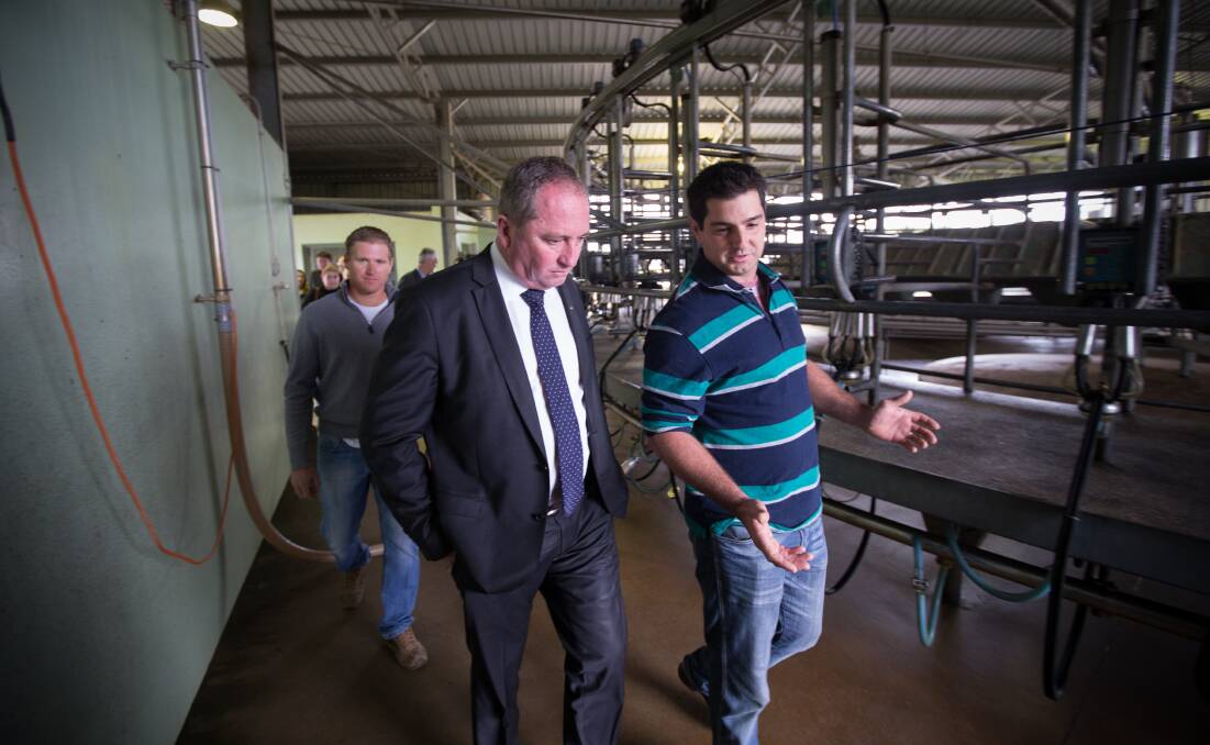 FARM VISIT: Agriculture Minister Barnaby Joyce visited dairy farmers and a processing plant in Shepparton, during the election campagin. Picture: Jason South.