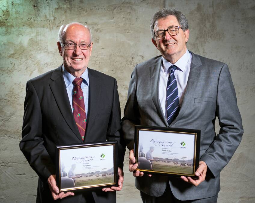 INDUSTRY HONOR: Garry Kuhn and Rob Norton were honoured with recognition awards before hundreds of fertiliser industry professionals at Fertiliser 2017, the joint national conference of Fertilizer Australia and the Australian Fertiliser Service Association (AFSA) Victorian branch.
