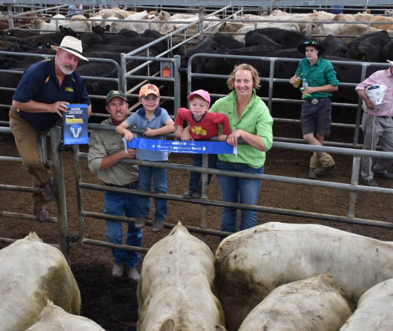 BEST PRESENTED: Best presented Charolais steers, from Raelene Mold (right) and Jim Garlick, Barina, Yea, with Eamon, 6, and Ashton, 3, and Ivan Pyke, Eprinix, (left). 