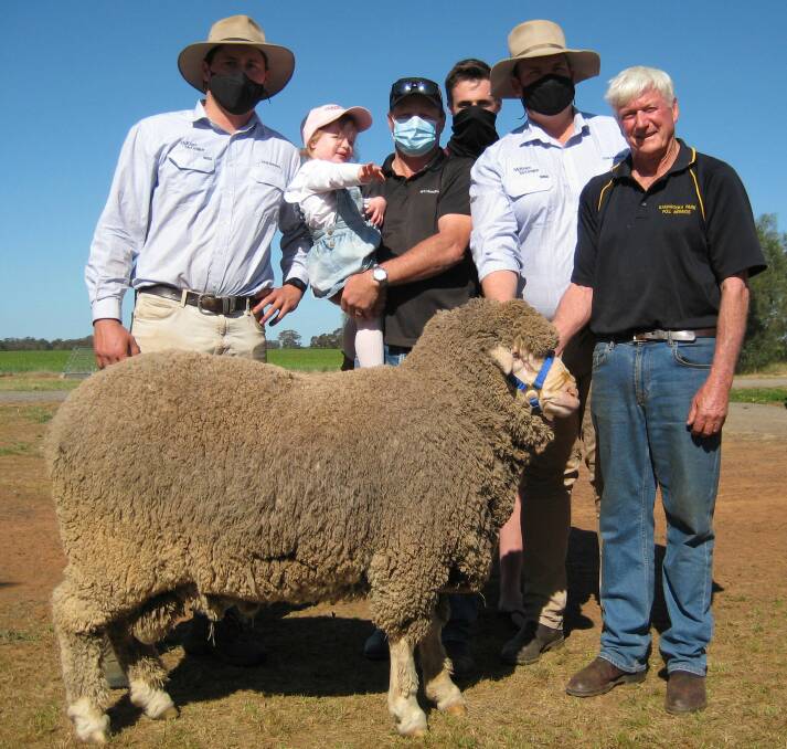 SALE TOPPER: The top priced ram with Will Holt - McKean McGregor, Maisie Collins, buyer Chris Powell, Alex Powell, Alex Collins - Auctioneer and Erroll Hay - Kamarooka Park.
