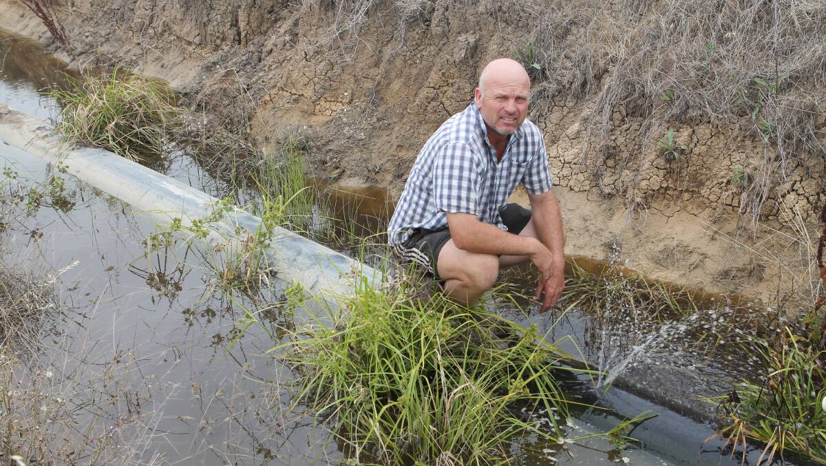 FAULTY SYSTEM: Colin Hay, Cohuna, is one of about 25 northern Victorian farmers plagued by faulty irrigation design and piping. PHOTO: Andrew Miller.
