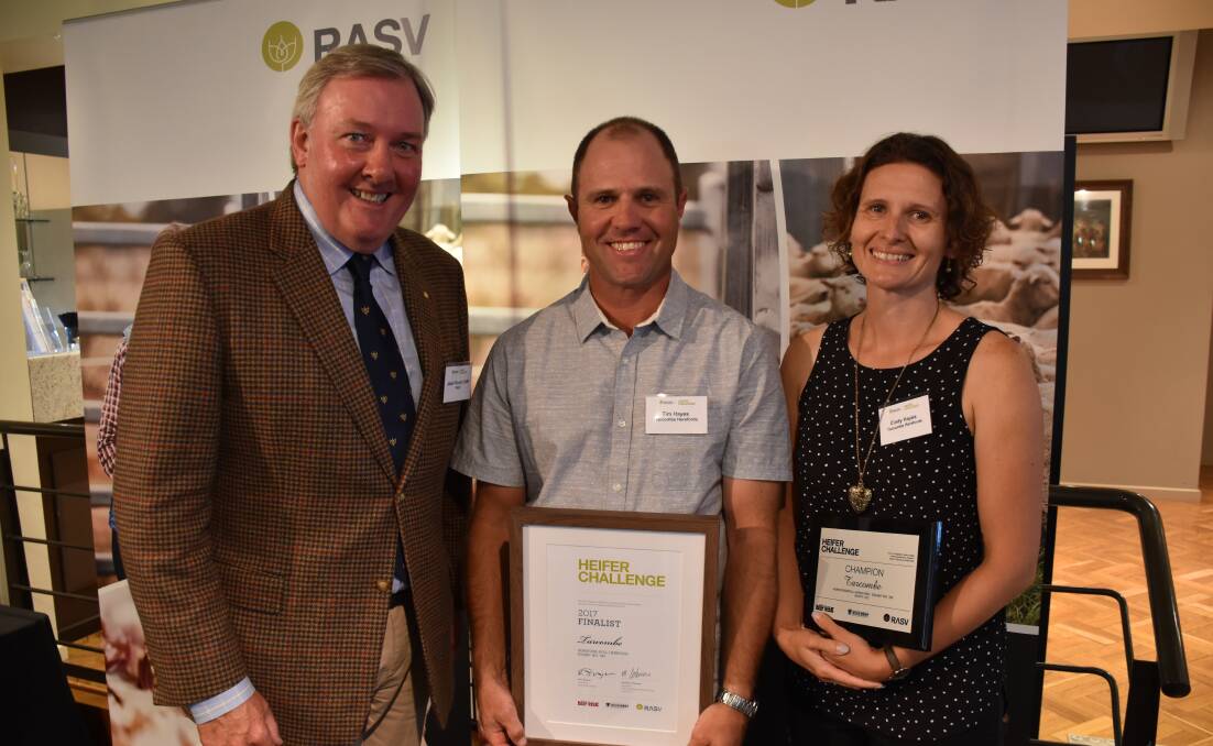 CHALLENGE WINNERS: Last year's winners, Tim and Cindy Hayes, Tarcombe Herefords and Poll Herefords, Ruffy, with RASV director Jason Ronald OAM.