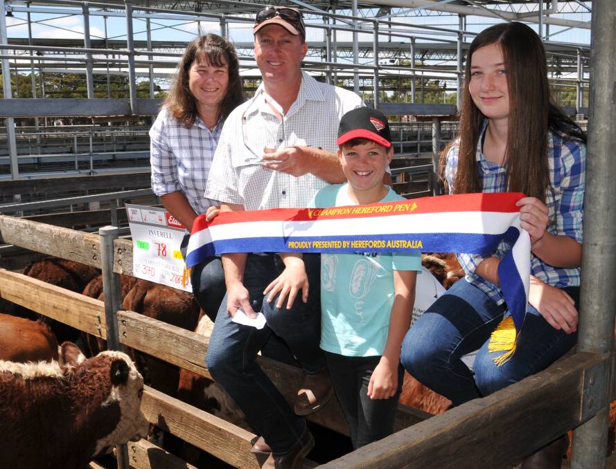 Tops: Liz, John, Sam and Maggie Craig, Inverell, with the champion pen of steers.