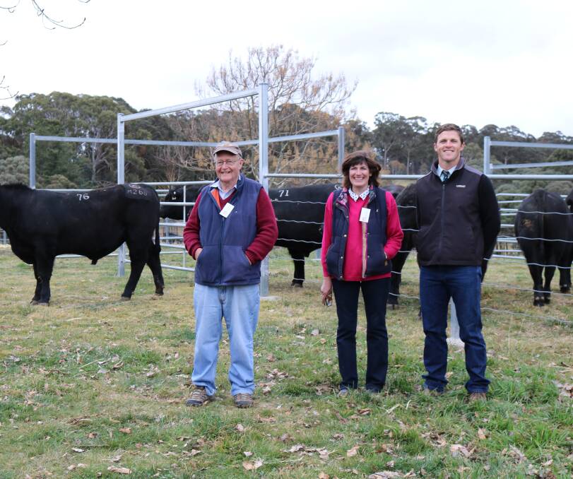 David Murray and Jo Burwell from Kilburnie, and Landmark agent Simon Newton with the $16,000 bull. Photo supplied