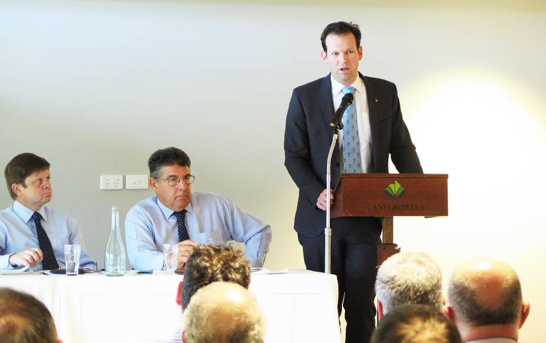 Northern Australia Minister Matt Canavan speaking at the CANEGROWERS Mackay meeting yesterday with CEO Kerry Latter (left) and Chair Kevin Borg. Picture supplied.