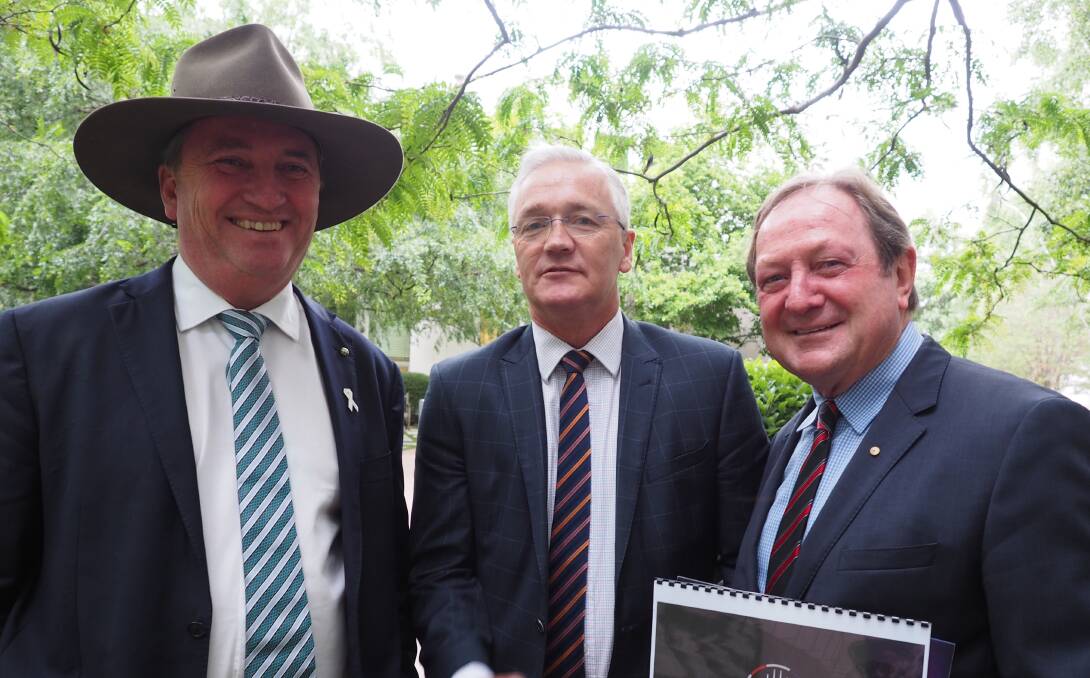 Pic: Agriculture and Water Resources Minister Barnaby Joyce (left), Nationals MP Damian Drum and AFL legend Kevin Sheedy.