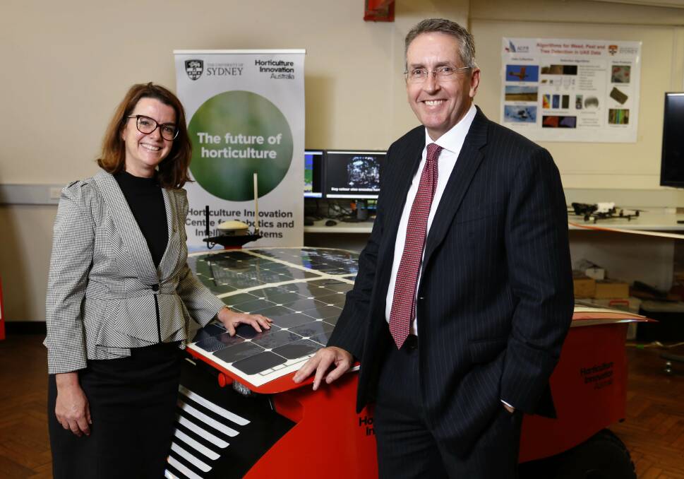 ROBOTS WELCOME: Assistant minister for agriculture Anne Ruston and Horticulture Innovation Australia chief executive John Lloyd at the opening of the new Horticulture Innovation Centre for Robotics and Intelligent Systems at the University of Sydney last week.