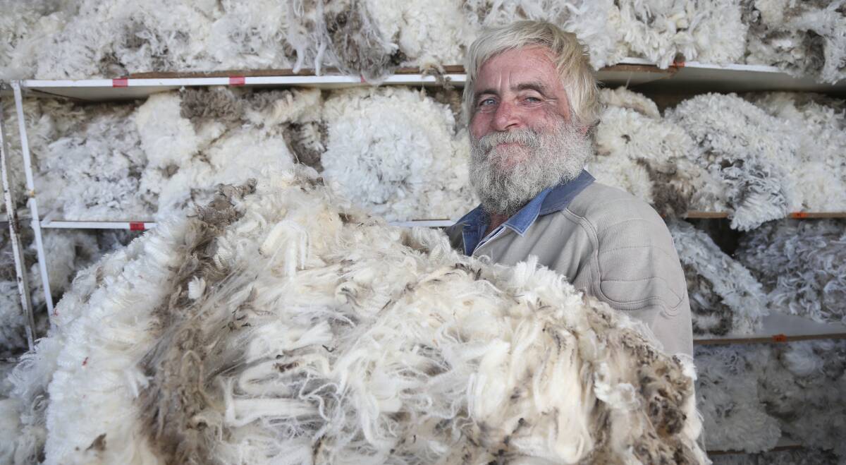 FINE CLIP: Central Victorian woolgrower Stuart McLelland is at home among the fleeces at the Ovens Valley Wether Trials. Picture: ELENOR TEDENBORG