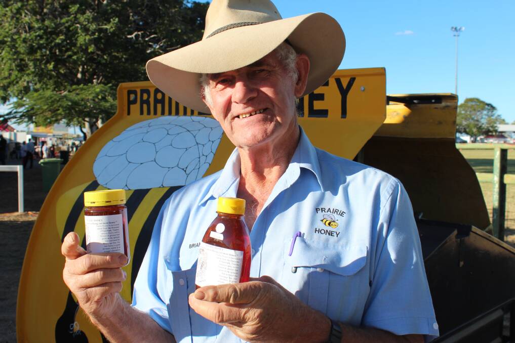 GOLD: Prairie Honey man Brian Prettejohn displays his raw and natural honey flavours of the outback. Photo: Samantha Walton.