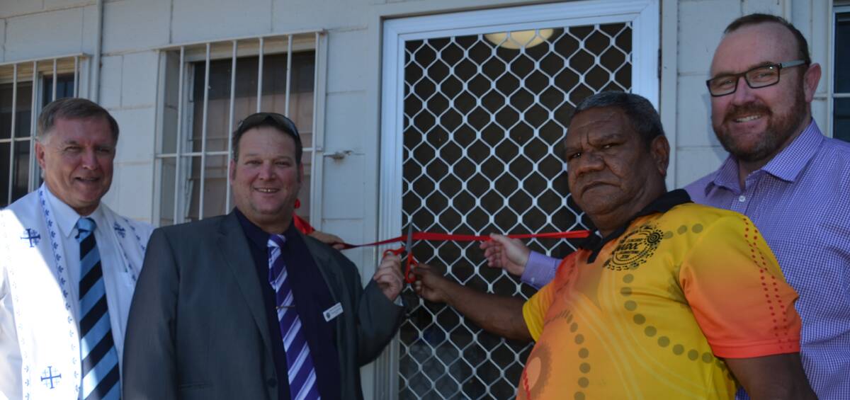 NEW BUILDING: Father Mick Lowcock, Dr Damien McGee, Hombre Major and Peter Monaghan open the new Cloncurry Centacare office. Photo: Derek Barry