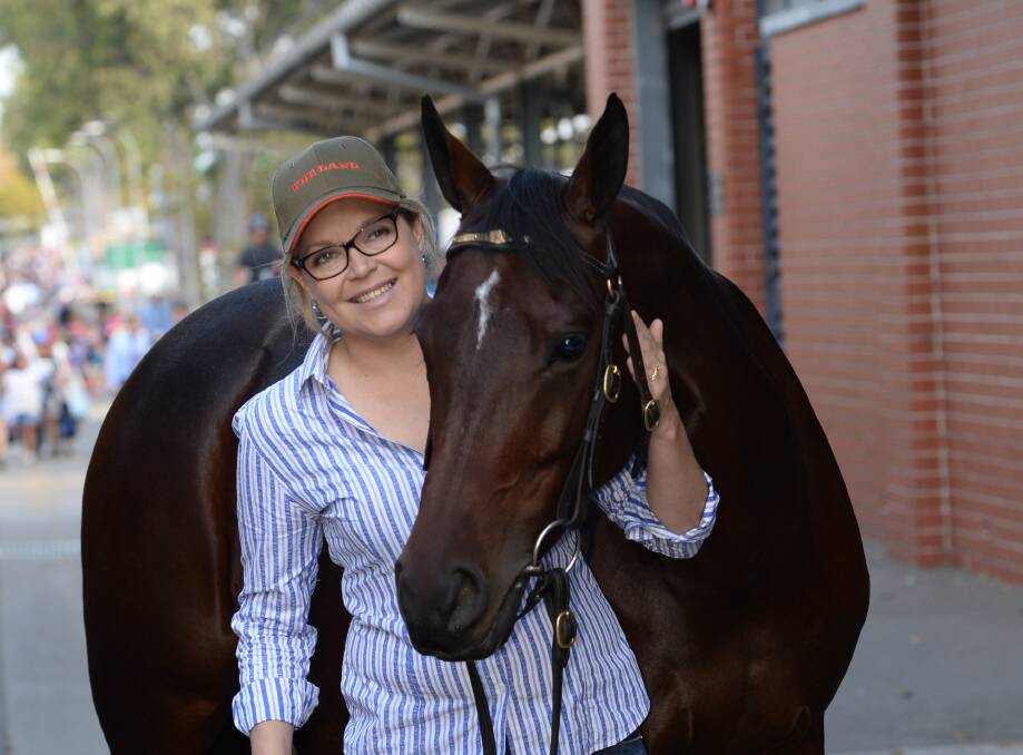Megan McLoughlin at Sydney Royal receives support from 'Cruising', owned by Matilda Jones, Scone.