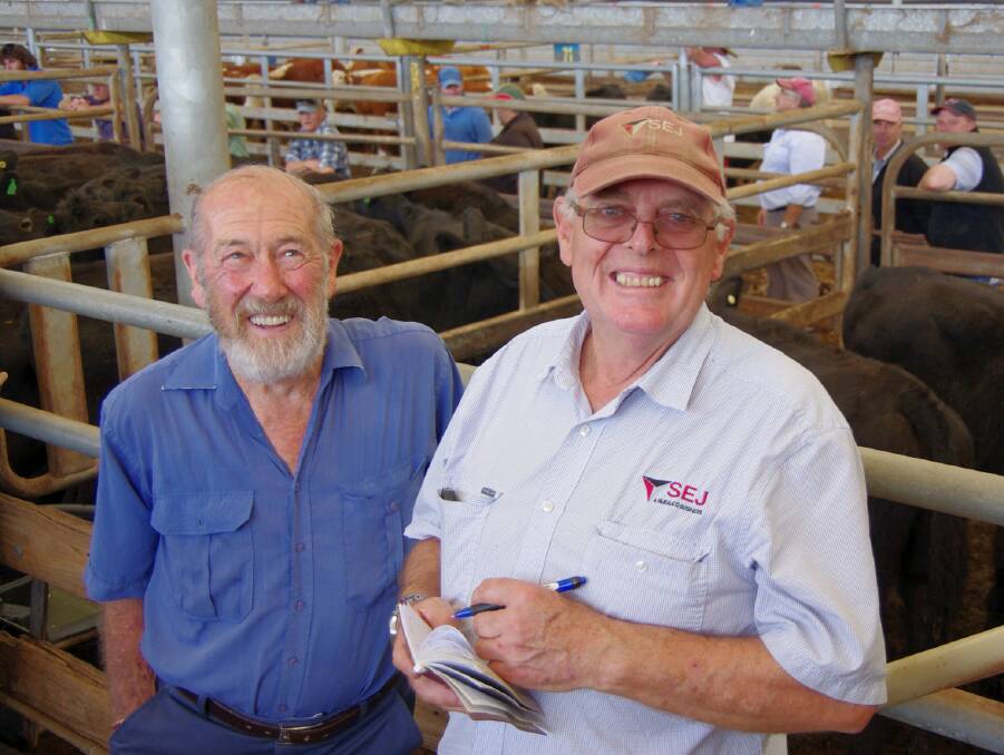 After selling his bullocks, Alex Campbell, Mirboo North (pictured with SEJ Livestock's Terry Johnston), bought these 343kg Angus steers.